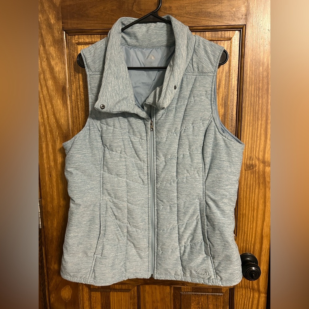 The North Face Light heathered blue women’s X-large Quilted Vest.